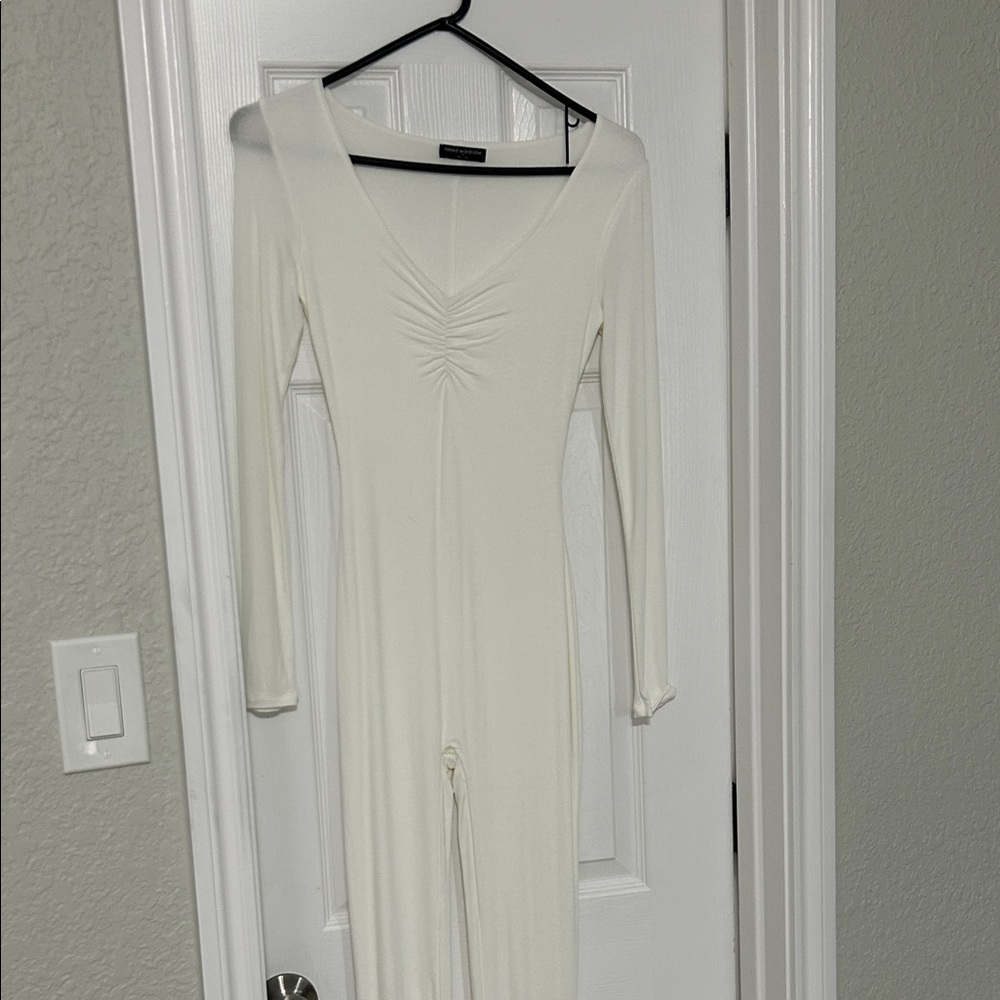 Naked Wardrobe off white low cut all body jumpsuit M